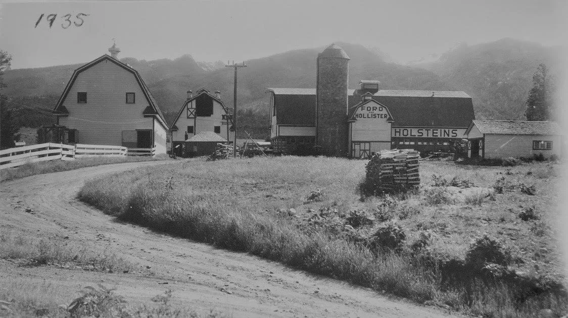 The ranch barns and silo in 1935, with the Holstein dairy sign